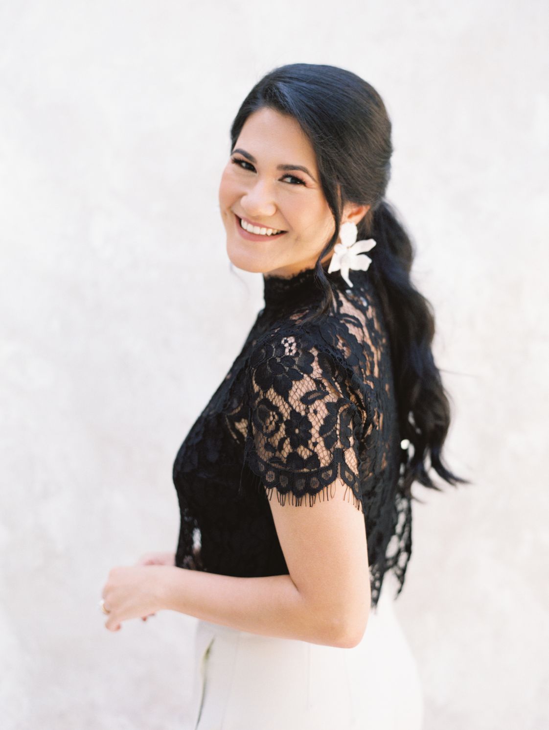 Fabiana Skubic, Founder and CEO of Centruva LLC, smiling in a black lace top.